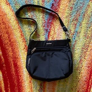 Tavelon Classic Anti-theft Crossbody Bag. Like New!